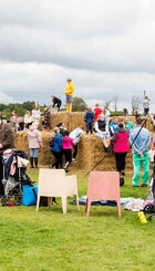Playday 2023: enjoying our haybale maze made from hay loaned from local farmers