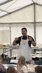 One of our Chefs in action with a previous children's' cookery session