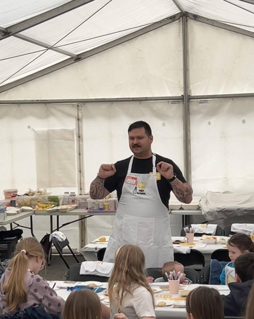 One of our Chefs in action with a previous children's' cookery session