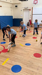 P1/P2 pupils from Brodick Primary enjoying some tennis related activities