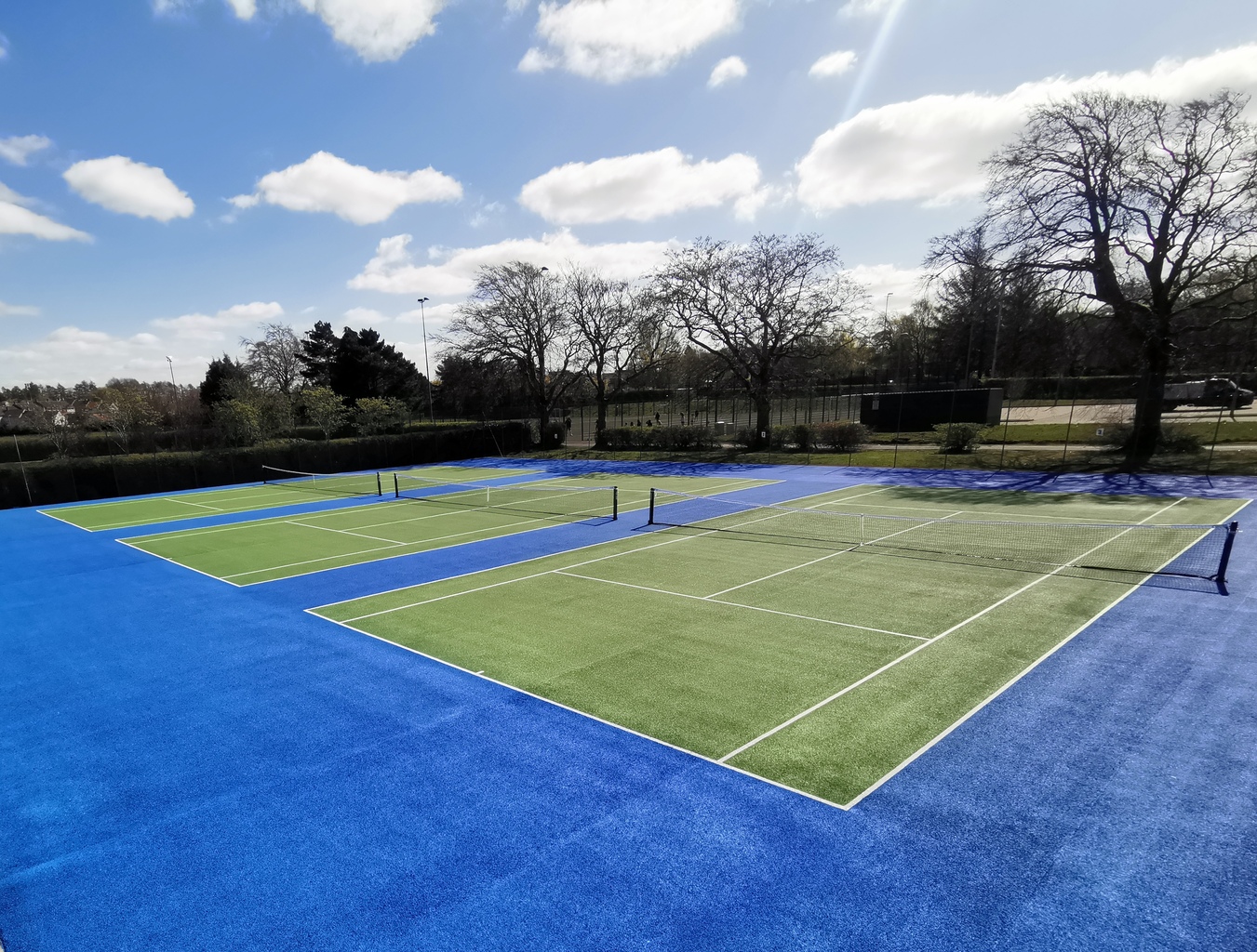 Resurfaced tennis courts.