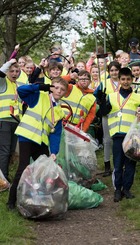 A school class enjoying helping keep Irvine clean and tidy.