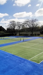 Resurfaced tennis courts.