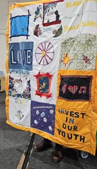 Textile piece made by Everyone an Artist group - 2025